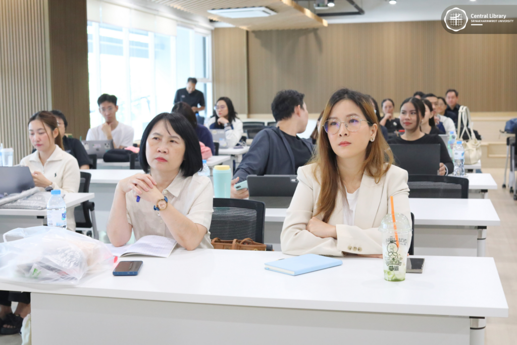 ต้อนรับคณะศึกษาดูงานจากหอสมุด มธ (7)