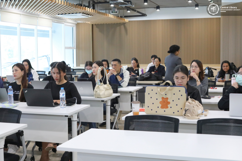 ต้อนรับคณะศึกษาดูงานจากหอสมุด มธ (8)